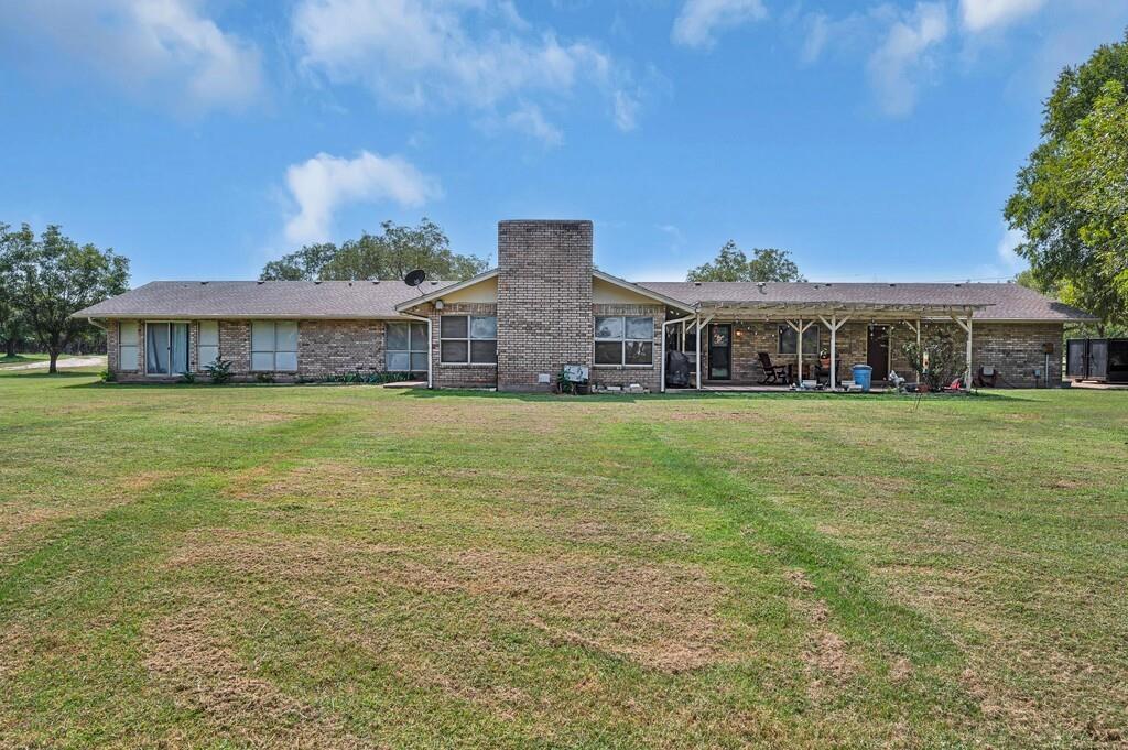 203 River Lane Waco, TX 76708 - Photo 39 of 40 a view of a house with a yard and sitting area