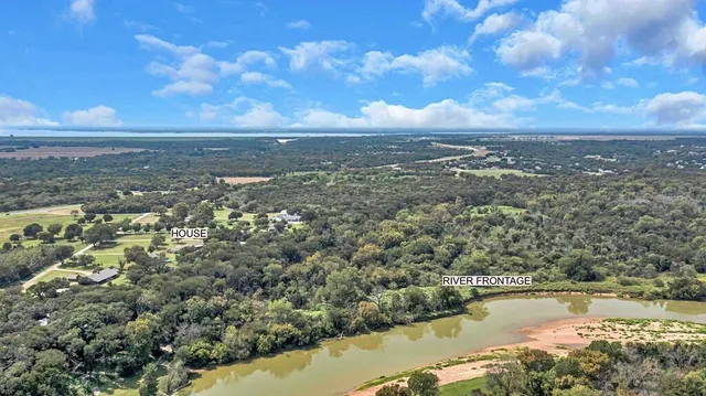 a view of a city with an ocean view