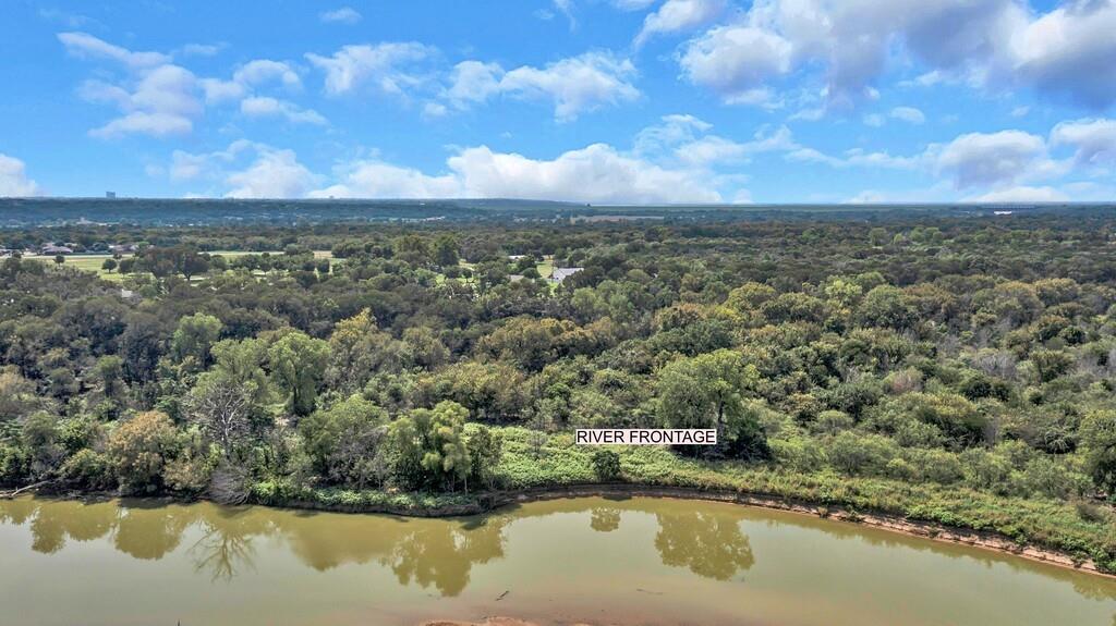 203 River Lane Waco, TX 76708 - Photo 6 of 40 a view of a lake with a city