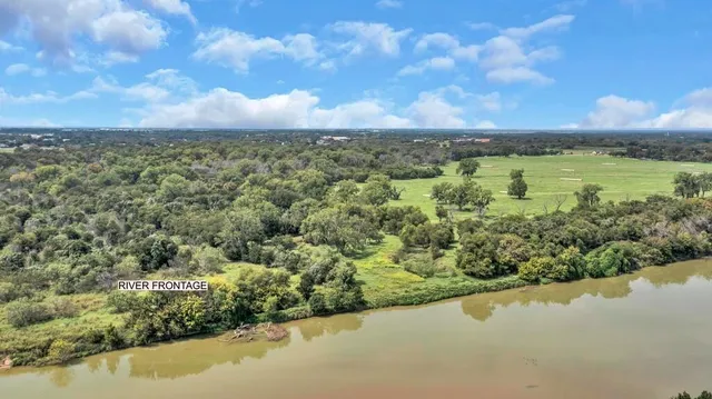a view of a lake with a city