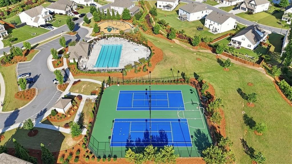6265 Privet Way Cumming, GA 30028 - Photo 40 of 47 an aerial view of a yard with plants