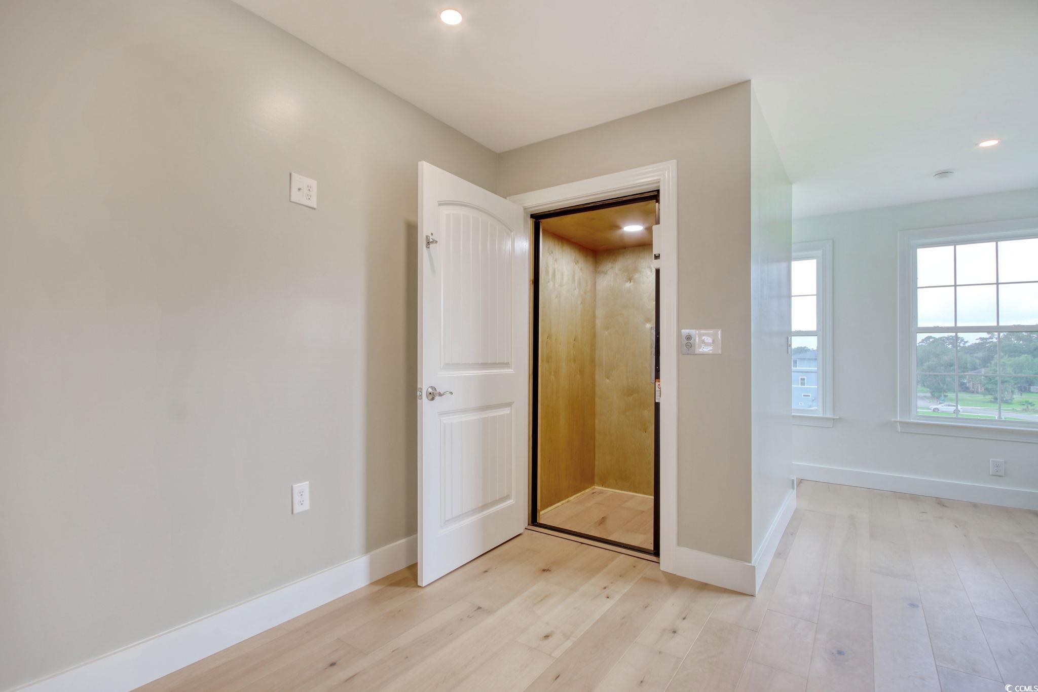 125 Oak Bay Drive Georgetown, SC 29440 - Photo 20 of 39 Entryway with light wood-type flooring and recessed lighting