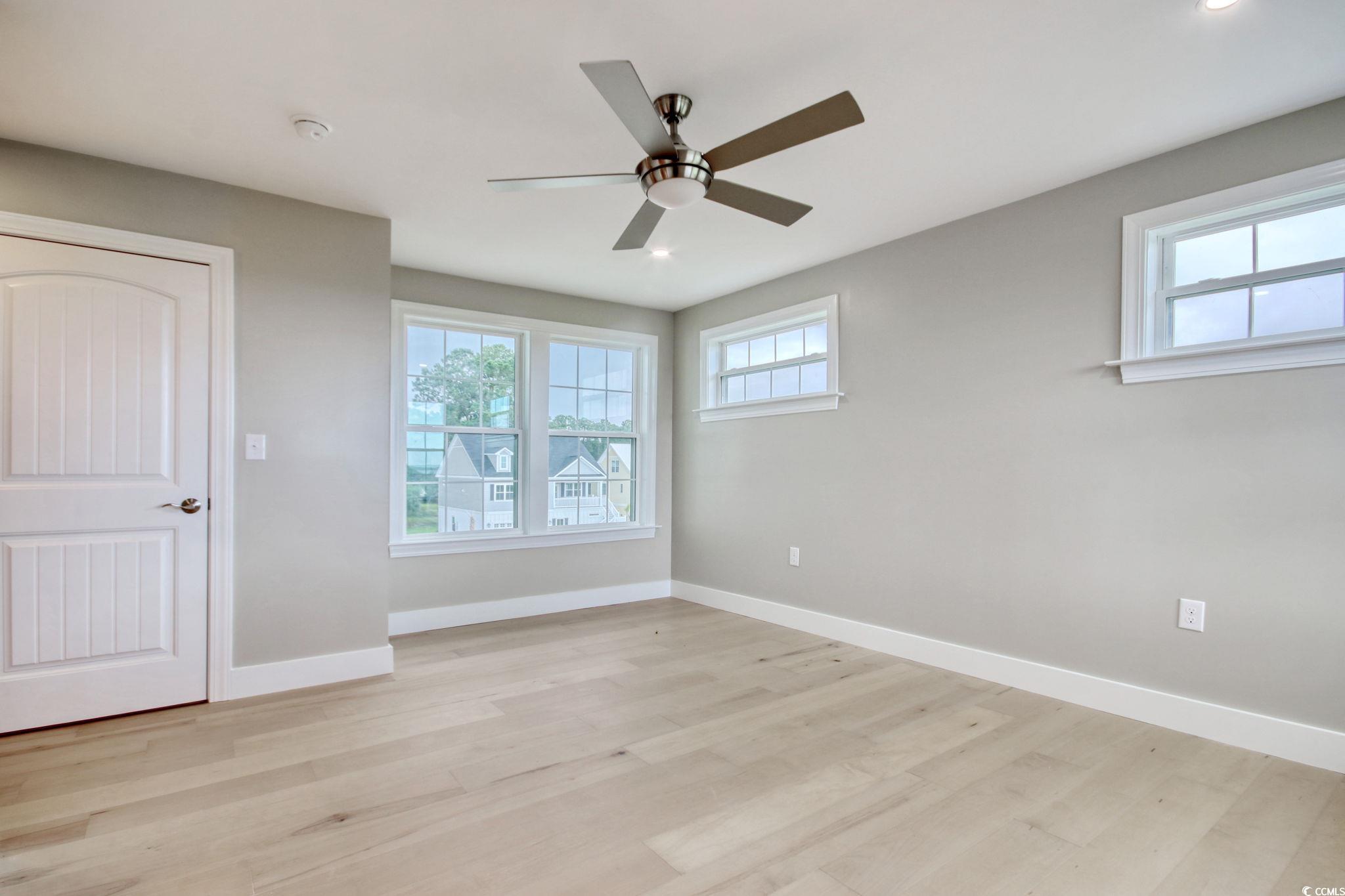 125 Oak Bay Drive Georgetown, SC 29440 - Photo 26 of 39 Unfurnished bedroom featuring light wood-type flooring, recessed lighting, and ceiling fan