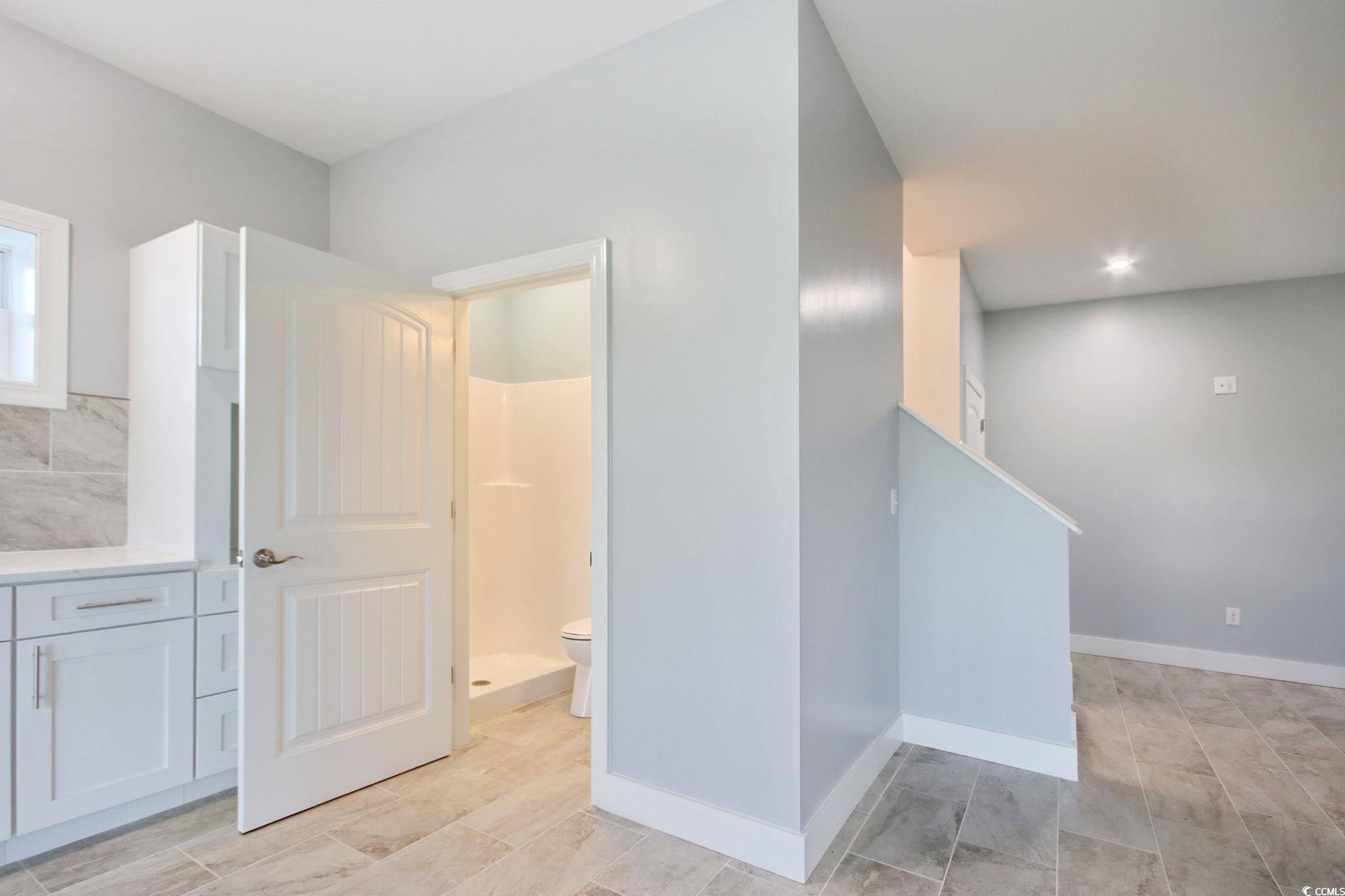125 Oak Bay Drive Georgetown, SC 29440 - Photo 30 of 39 Stairway with baseboards