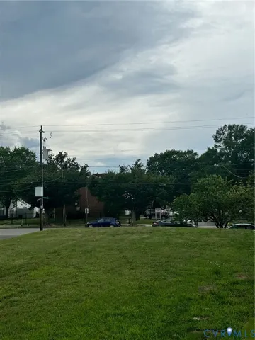 a view of a golf course with green space