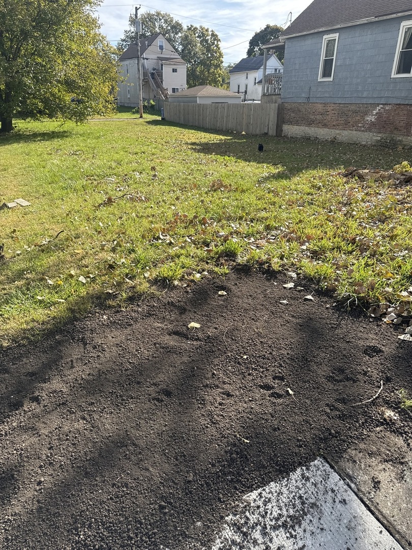 5943 South May Street Chicago, IL 60621 - Photo 3 of 3 a view of a yard with an outdoor space