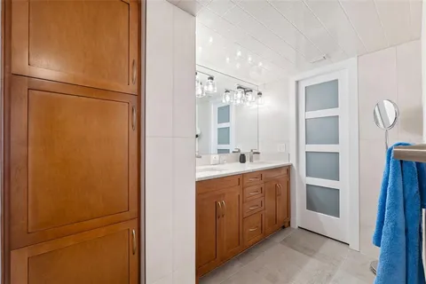 a bathroom with a shower and toilet