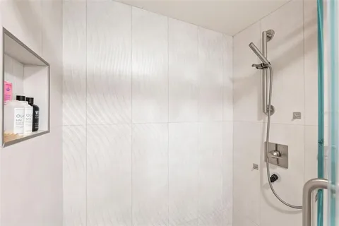 a view of a livingroom with furniture and a window