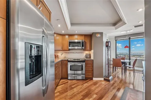a view of a living room and dining room