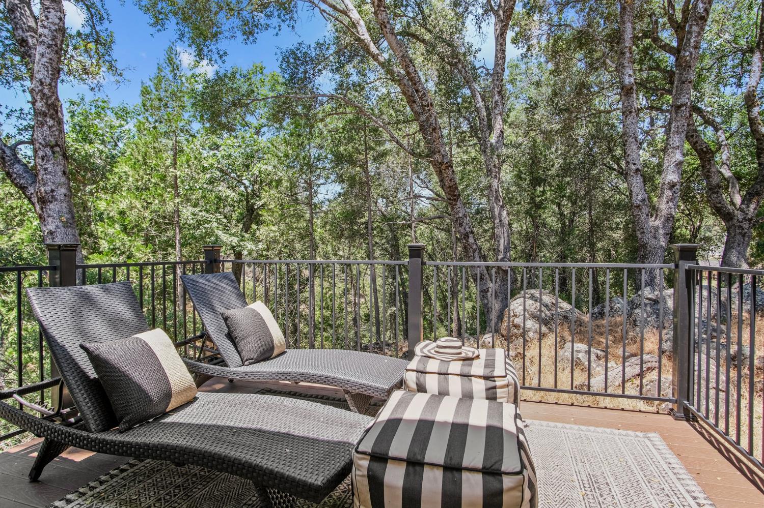 18950 Black Oak Road Sonora, CA 95370 - Photo 24 of 46 a view of a chair and table on the deck