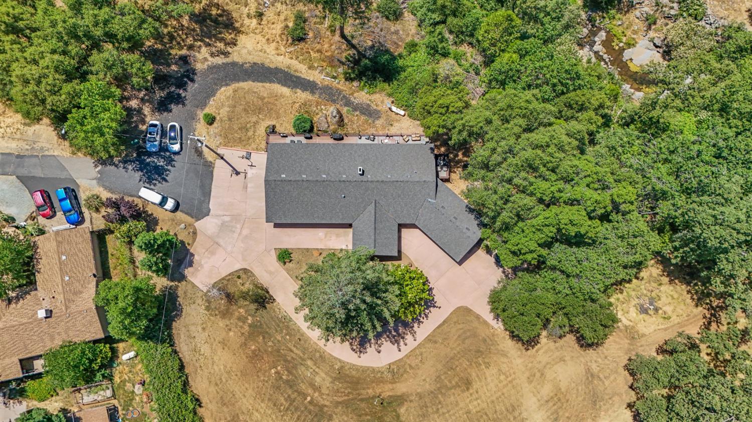 18950 Black Oak Road Sonora, CA 95370 - Photo 42 of 46 an aerial view of a house with a yard