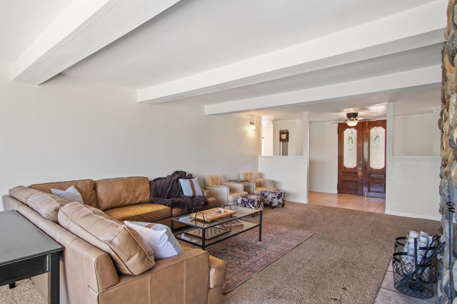 18950 Black Oak Road Sonora, CA 95370 - Photo 6 of 46 a living room with furniture and wooden floor
