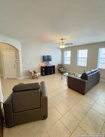 a living room with furniture and a couch