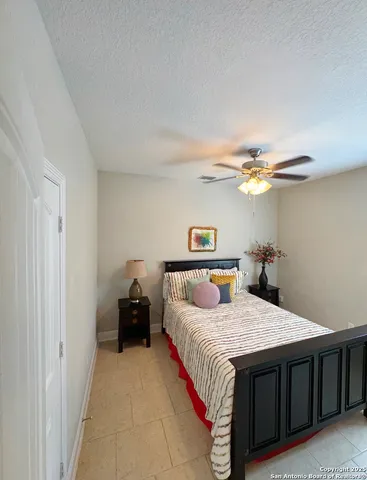 a kitchen with stainless steel appliances granite countertop a sink refrigerator and cabinets