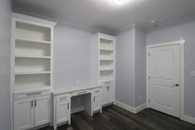 a room with a furniture and a window