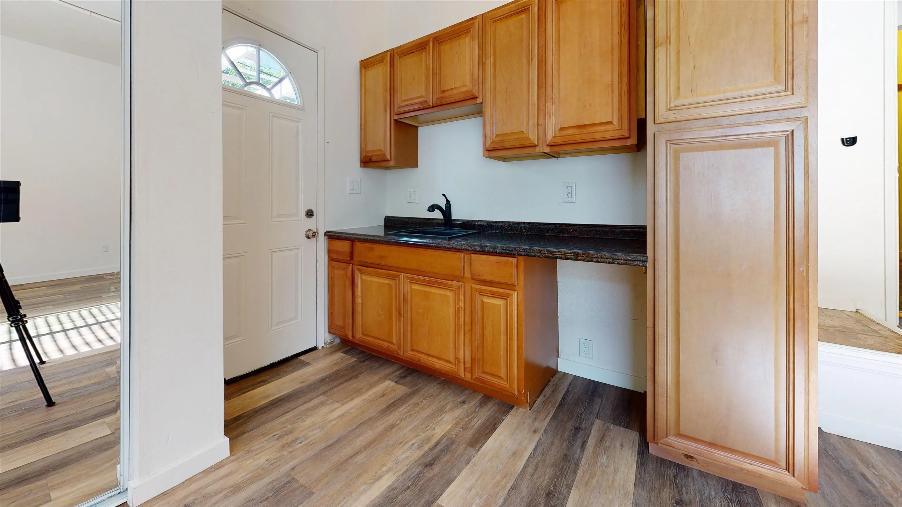 5555 Mary Ln Drive San Diego, CA 92115 - Photo 13 of 39 a view of cabinets and wooden floor