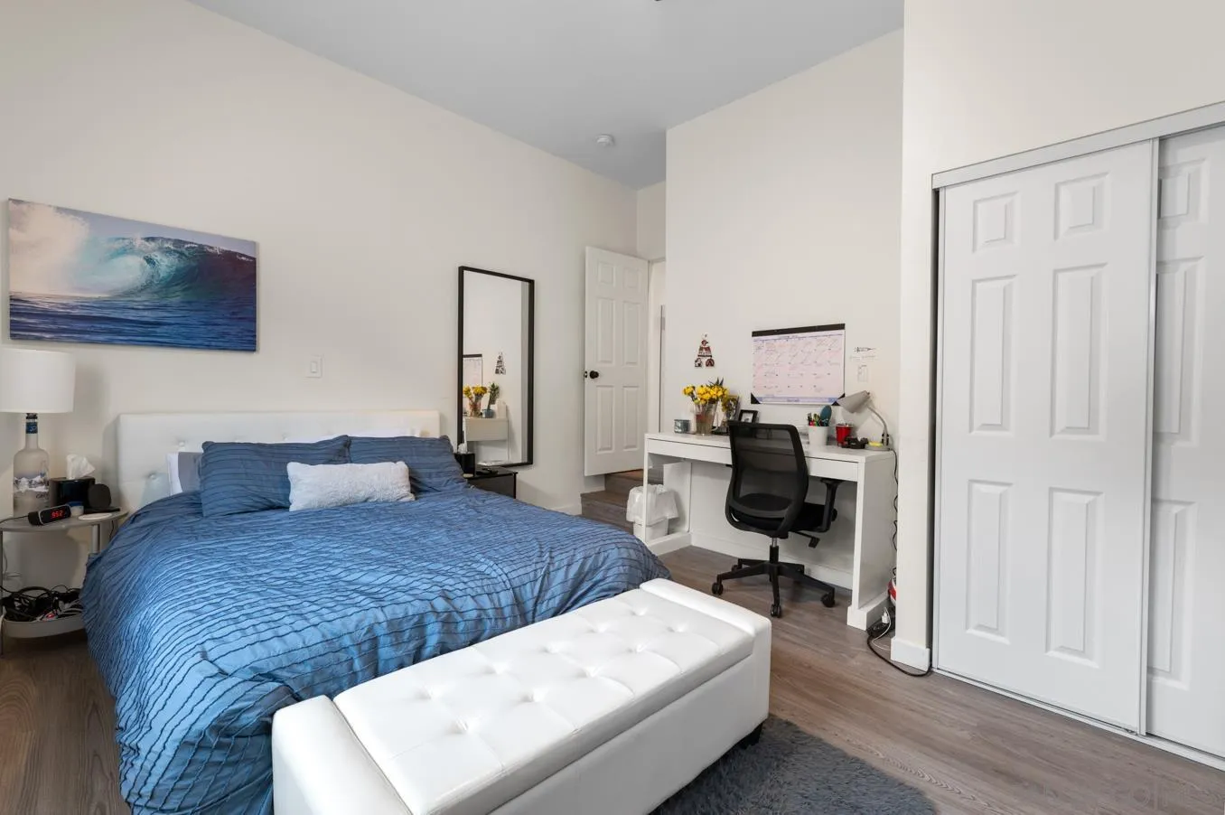 5555 Mary Ln Drive San Diego, CA 92115 - Photo 24 of 39 a bedroom with a bed and a chair