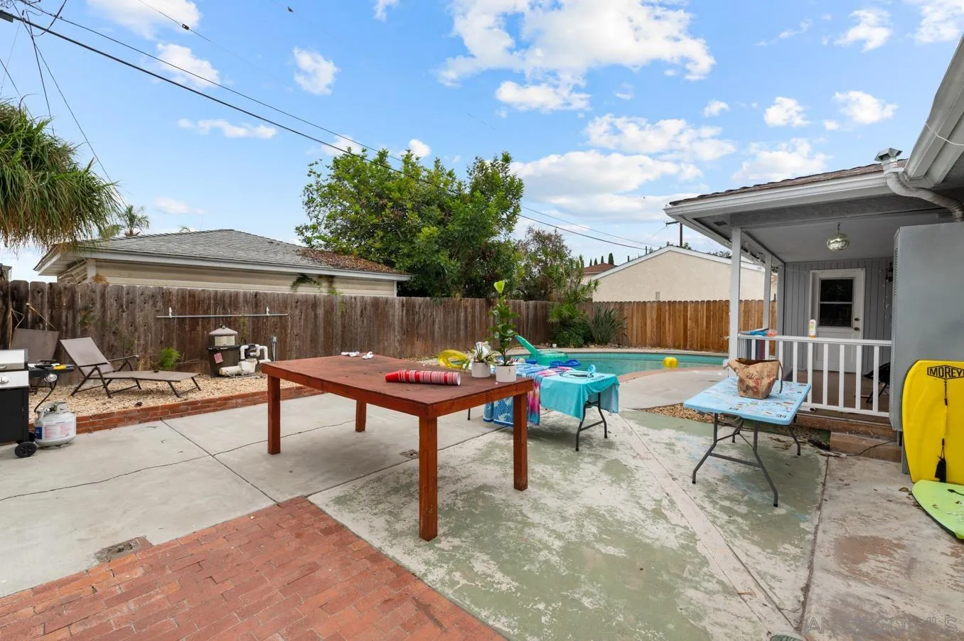 5555 Mary Ln Drive San Diego, CA 92115 - Photo 36 of 39 a swimming pool with outdoor seating and yard