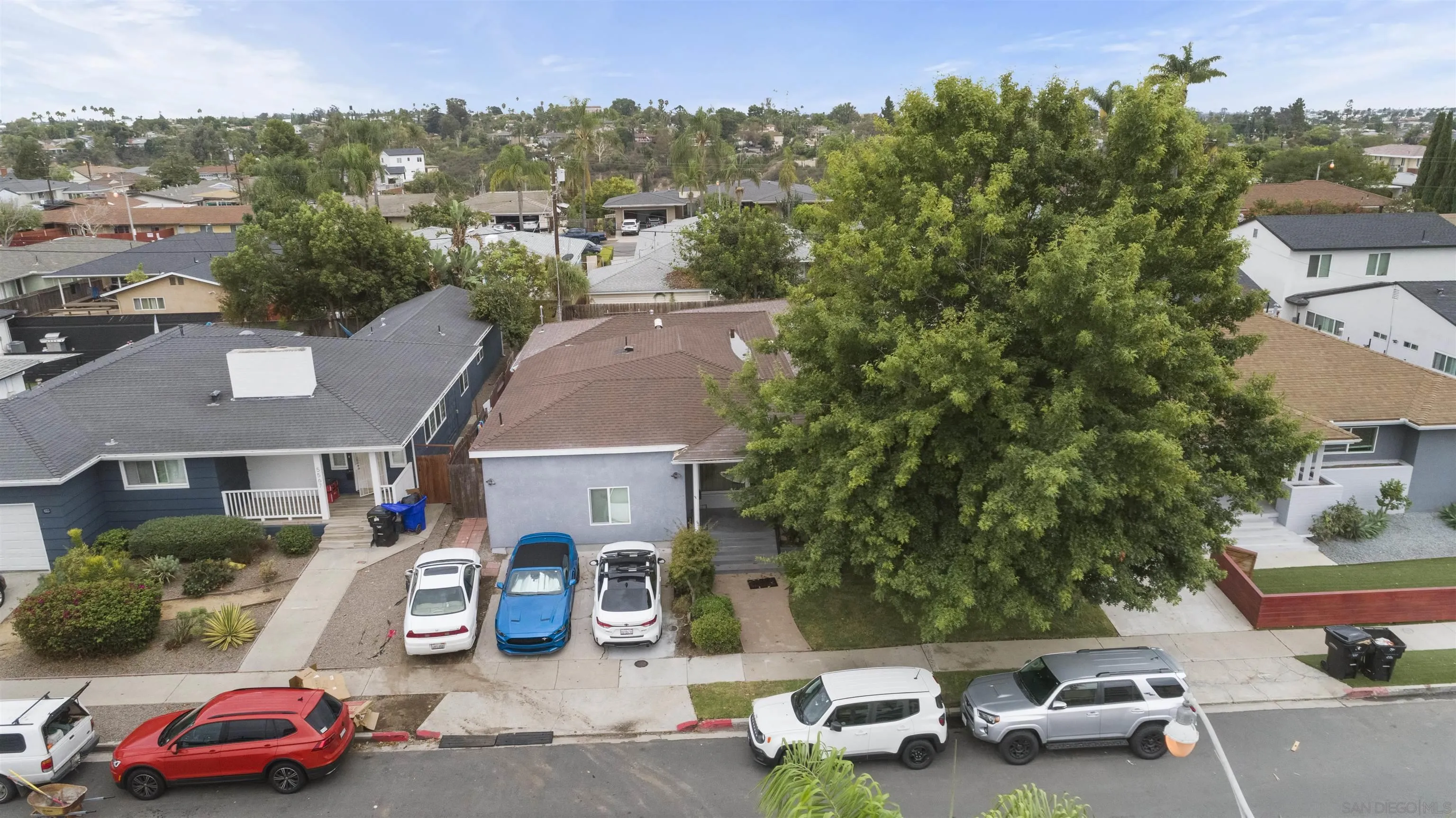 5555 Mary Ln Drive San Diego, CA 92115 - Photo 37 of 39 an aerial view of a house with car parked