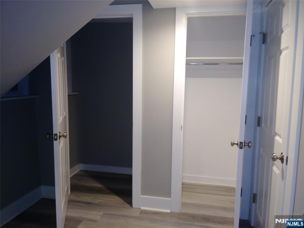 20 Goffle Road Midland Park, NJ 07432 - Photo 11 of 16 a bathroom with a walk in closet and closet