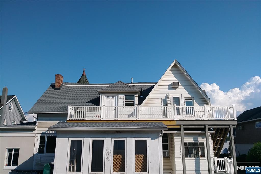20 Goffle Road Midland Park, NJ 07432 - Photo 16 of 16 a view of house with roof deck and seating space