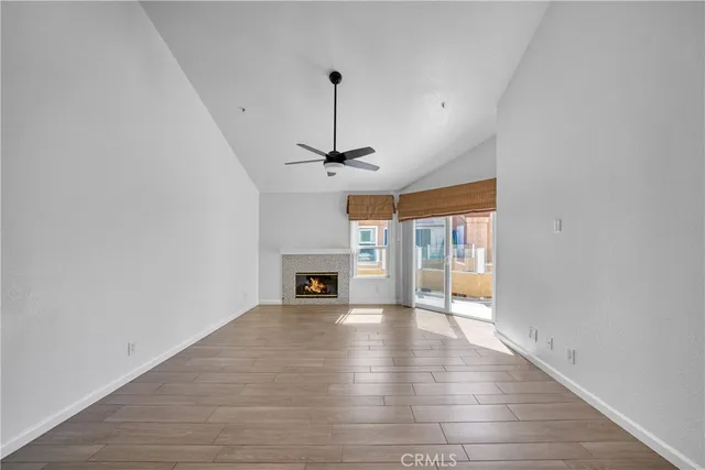 a view of a kitchen with a sink and a window