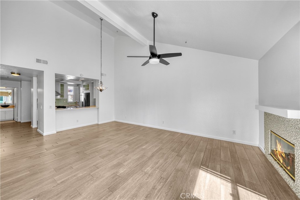 2000 Pacific Coast Highway, Unit 309 Huntington Beach, CA 92648 - Photo 17 of 32 a view of a kitchen with a sink and a window