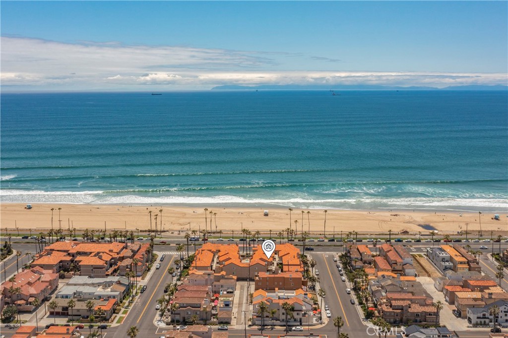 2000 Pacific Coast Highway, Unit 309 Huntington Beach, CA 92648 - Photo 31 of 32 a view of an ocean and beach