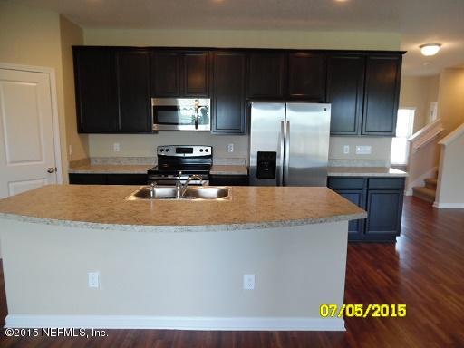3087 Chestnut Ridge Way, Unit 21D Orange Park, FL 32065 - Photo 12 of 34 CR 21D - Kitchen Island & Cabs