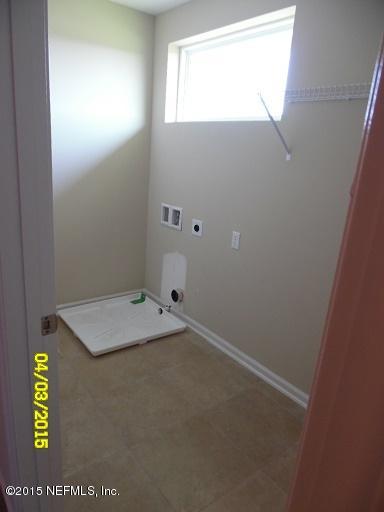 3087 Chestnut Ridge Way, Unit 21D Orange Park, FL 32065 - Photo 21 of 34 CR 21D - 2nd Floor Laundry Rm - 4-3-2015