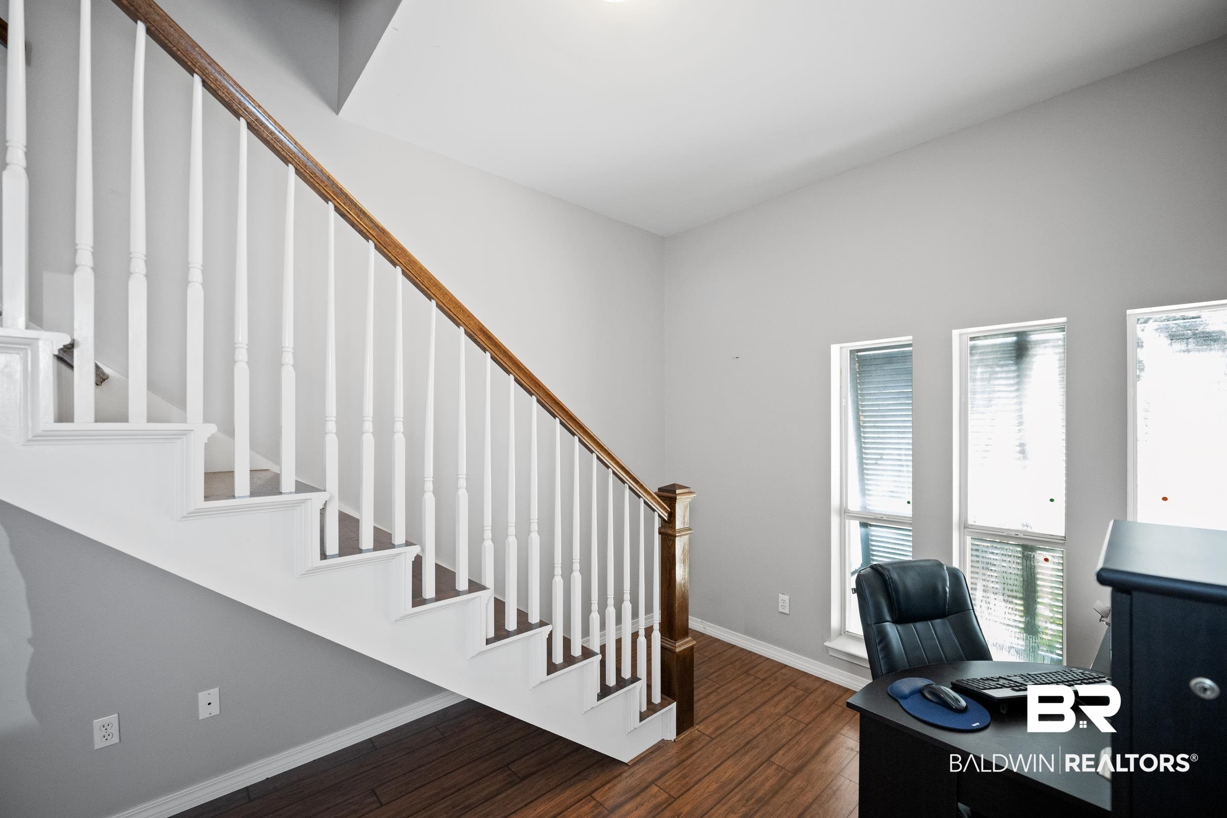 8585 Bay Harbor Road Elberta, AL 36530 - Photo 30 of 51 Office space with dark wood-style flooring and baseboards