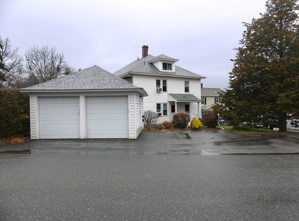 a view of a house with a street