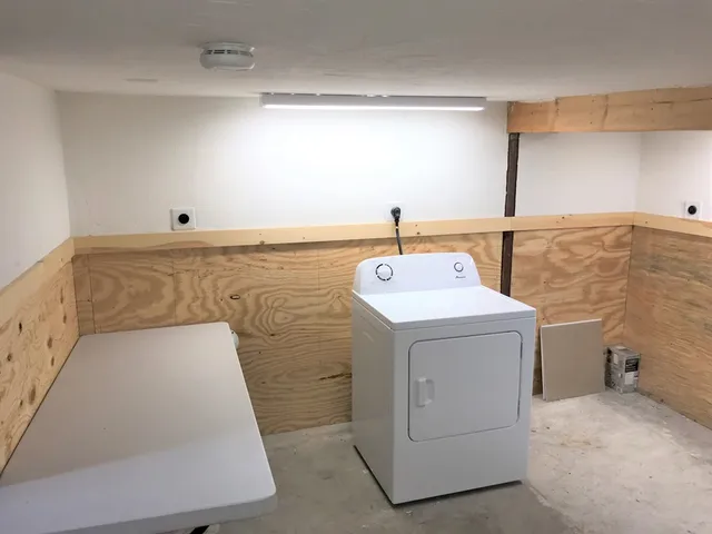 a utility room with dryer and washer