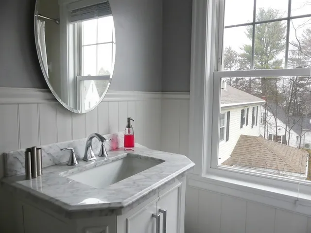 a kitchen with a sink a window and a sink