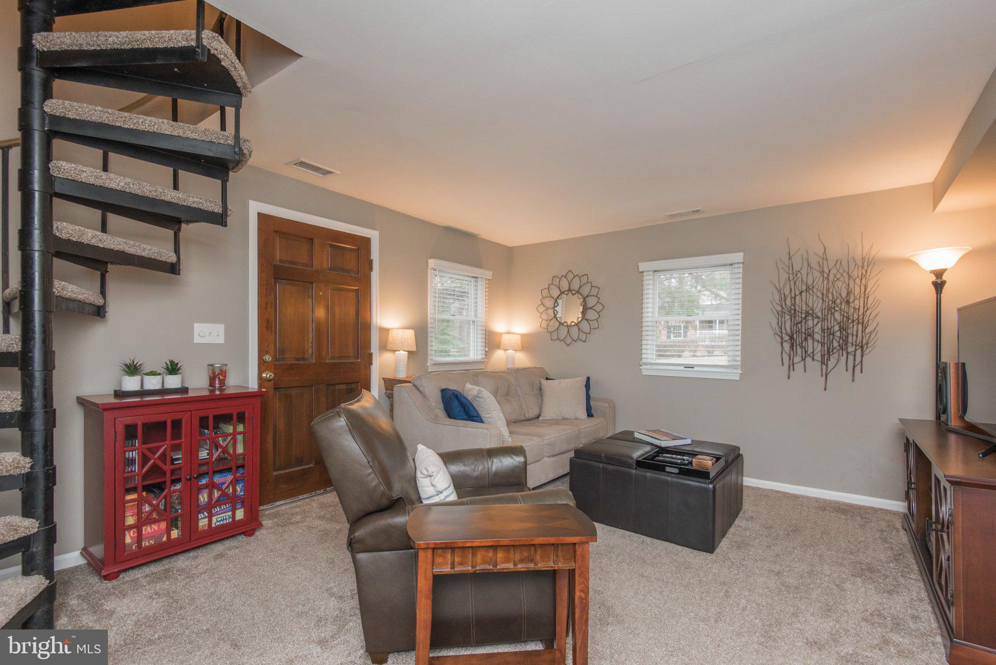 650 North Valley Forge Road Devon, PA 19333 - Photo 4 of 38 Cozy living space with spiral staircase.