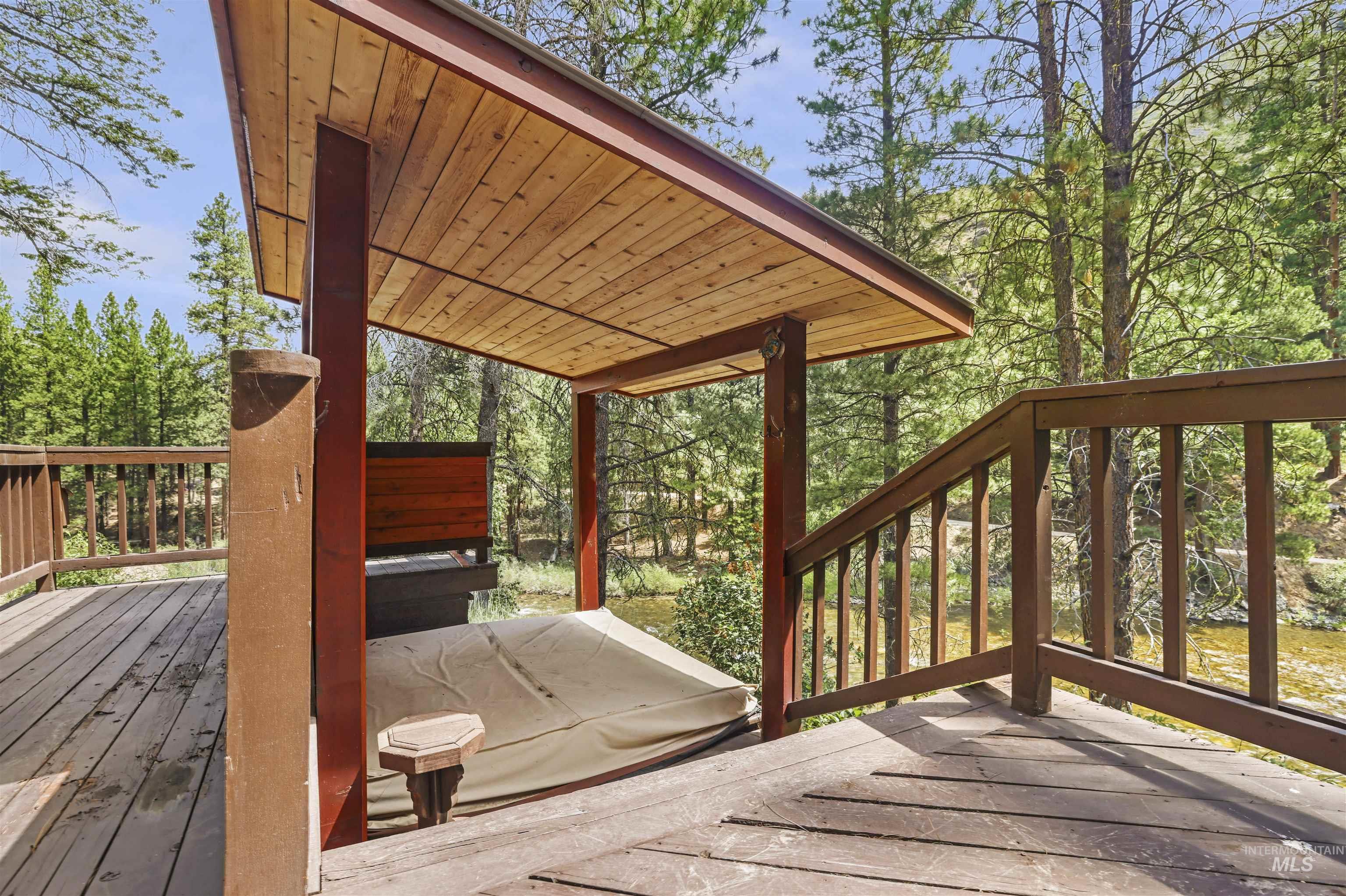 224 Dakota Road Mountain Home, ID 83647 - Photo 35 of 50 Expansive wood-finish deck featuring a covered outdoor spa area
