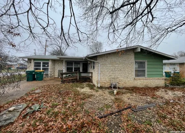 a front view of house with yard and seating area
