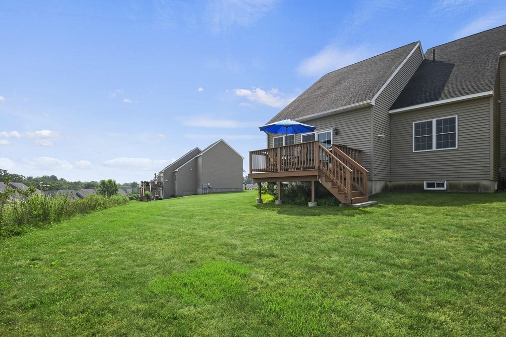 148 Ariel Circle, Unit 148 Sutton, MA 01590 - Photo 34 of 35 a house view with a garden space