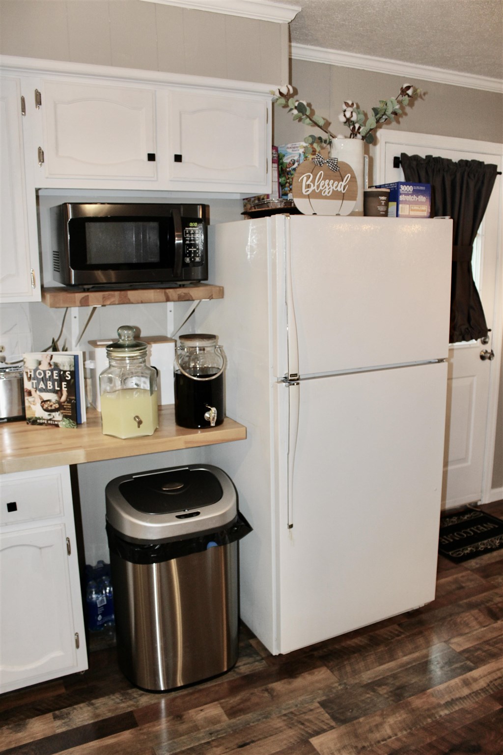 31 Old Back Road Raphine, VA 24472 - Photo 23 of 52 a kitchen with a refrigerator and a stove top oven