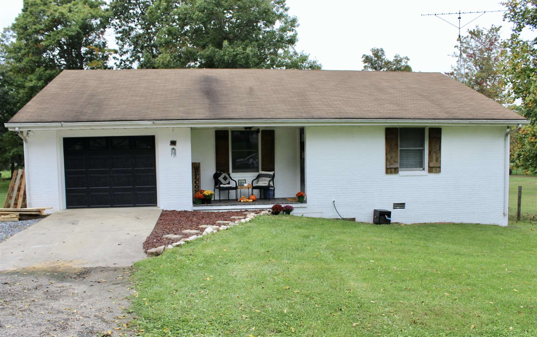 31 Old Back Road Raphine, VA 24472 - Photo 3 of 52 a front view of house with yard and outdoor seating