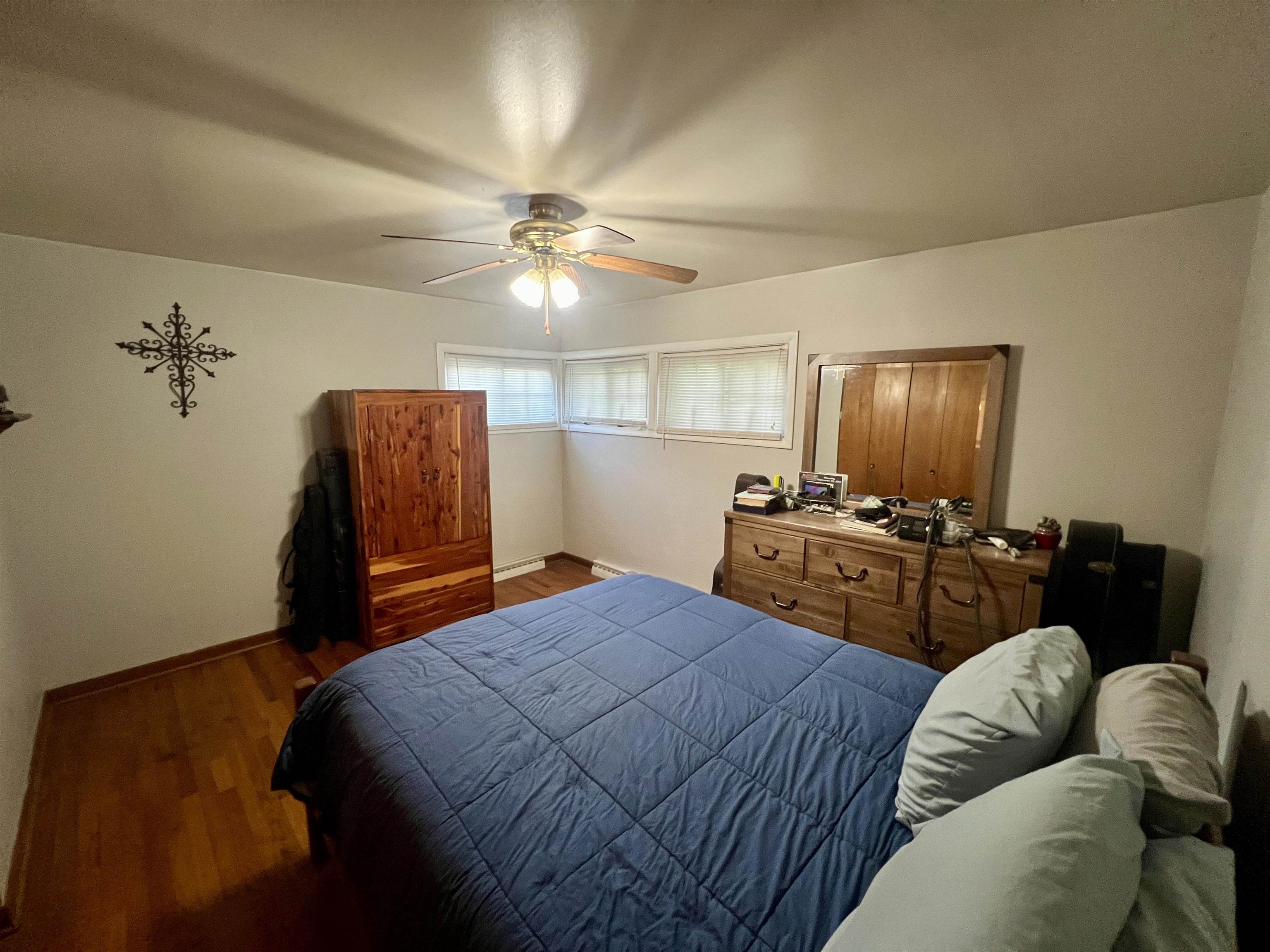 6631 Spring Creek Road Bridgewater, VA 22812 - Photo 18 of 34 a bedroom with furniture and a bed