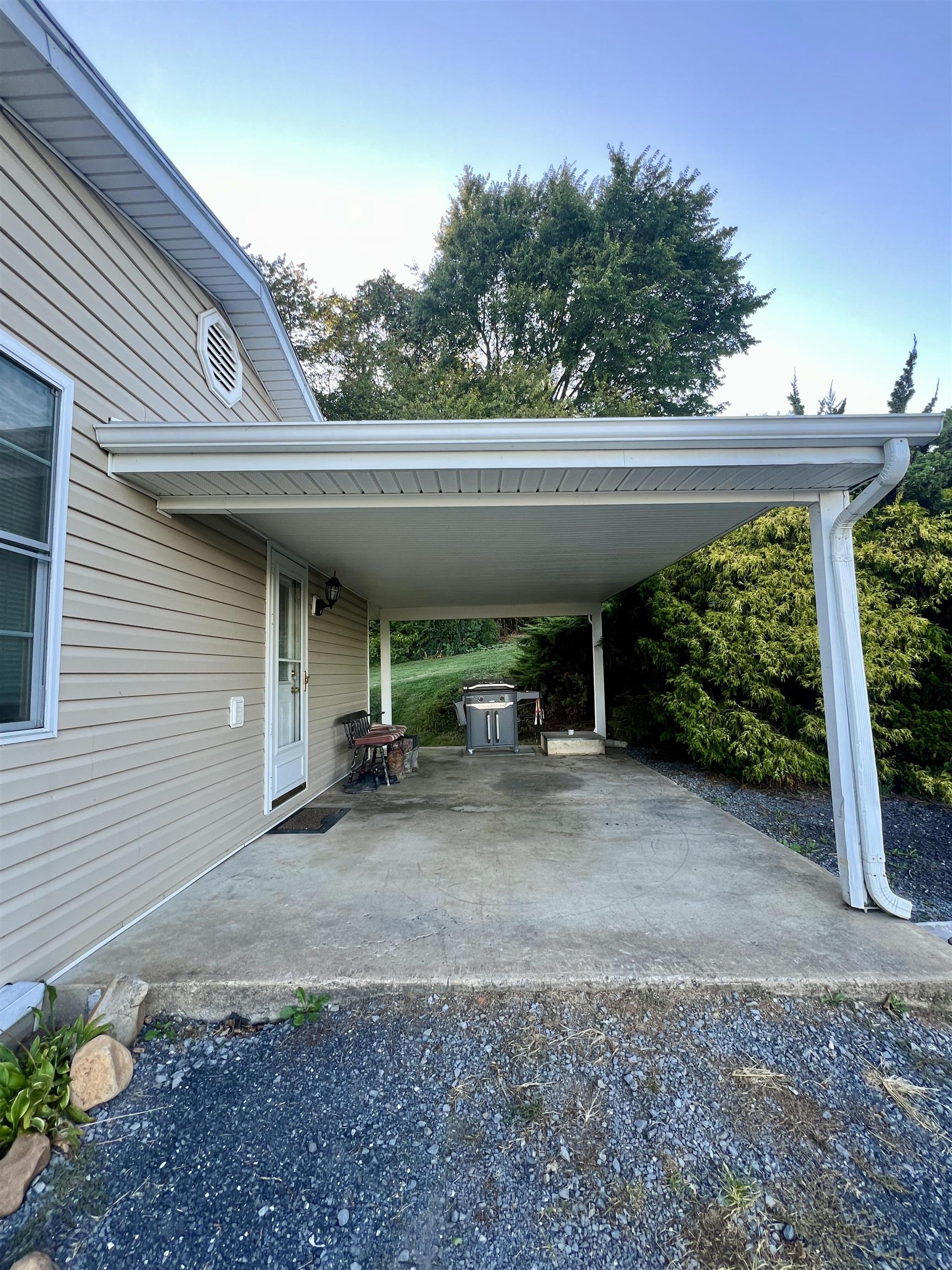 6631 Spring Creek Road Bridgewater, VA 22812 - Photo 5 of 34 a view of a house with a backyard