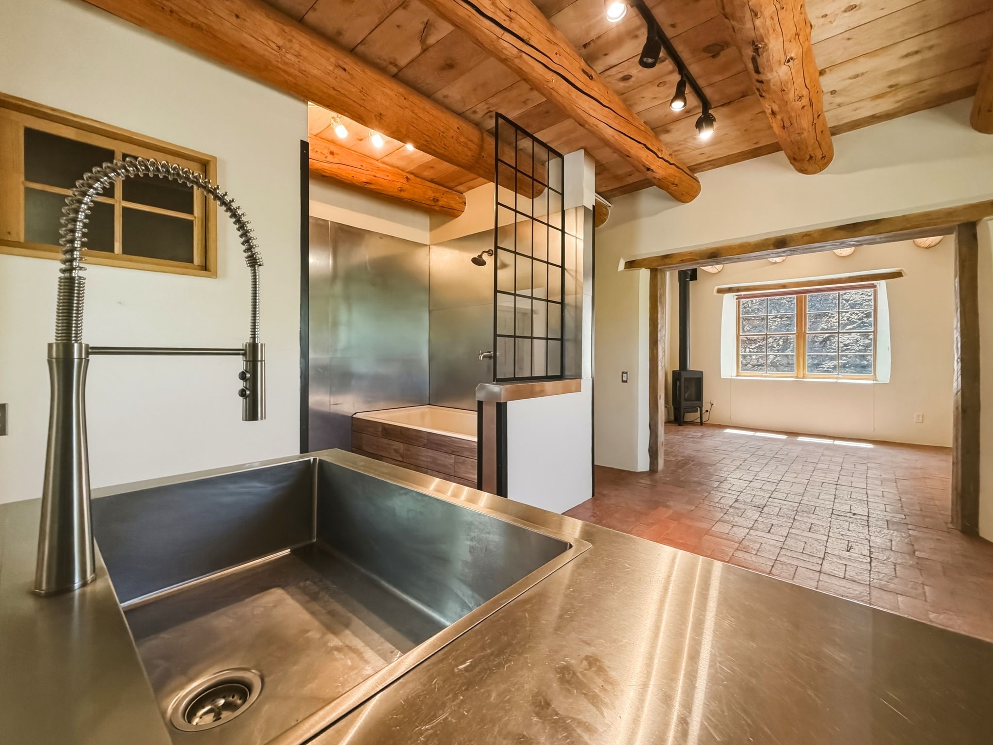 1692 Upper Canyon Road Santa Fe, NM 87501 - Photo 23 of 52 Looking from the sink to Living Area/Bedroom/Office