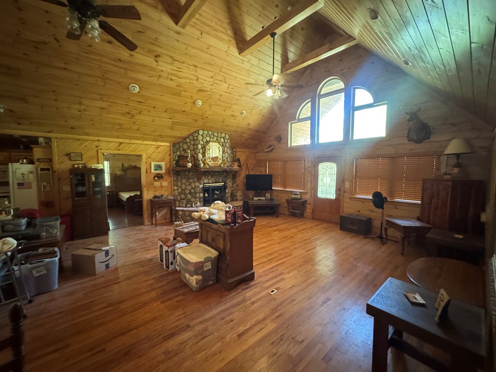 33 Big Tree Road Suches, GA 30572 - Photo 8 of 25 a living room with furniture and a wooden floor