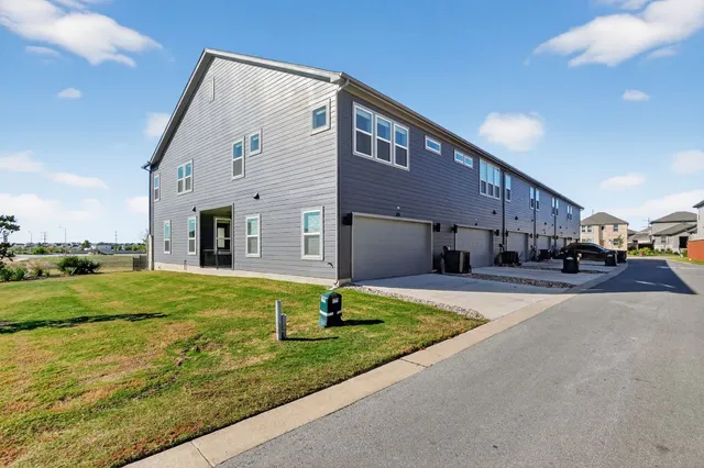 a house view with a garden space