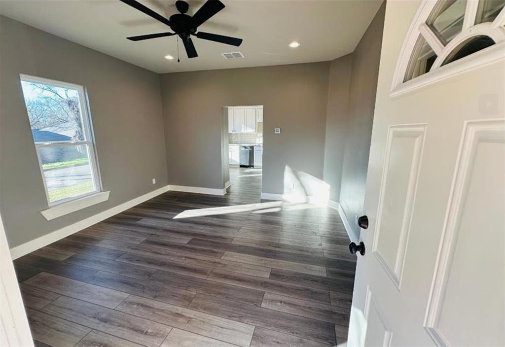 1408 East Houston Street Tyler, TX 75702 - Photo 4 of 15 a view of empty room with wooden floor