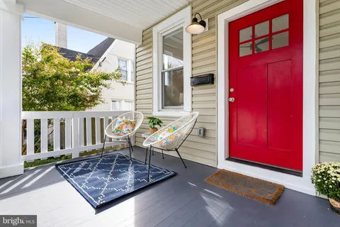 a bench sitting in front of a building