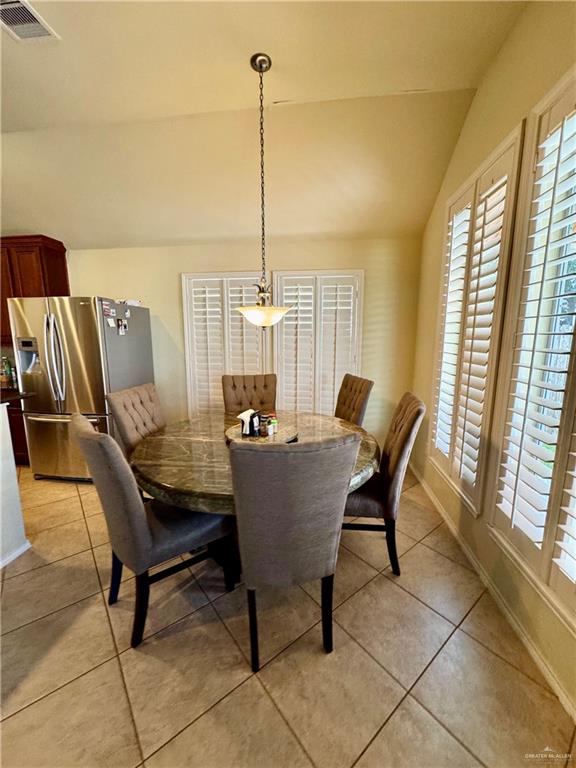 2911 San Rafael Street Mission, TX 78572 - Photo 11 of 38 a view of a dining room with furniture window and outside view