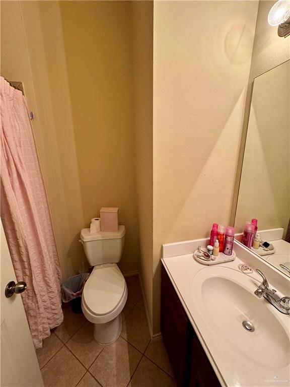 2911 San Rafael Street Mission, TX 78572 - Photo 25 of 38 a bathroom with a sink and a toilet