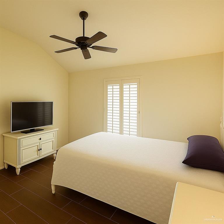 2911 San Rafael Street Mission, TX 78572 - Photo 31 of 38 a bedroom with a bed and flat screen tv